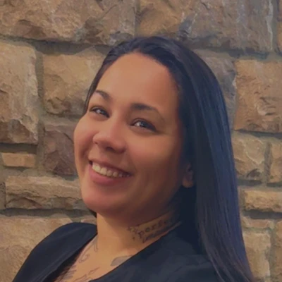 A headshot photo of Melissa, a clinical team member